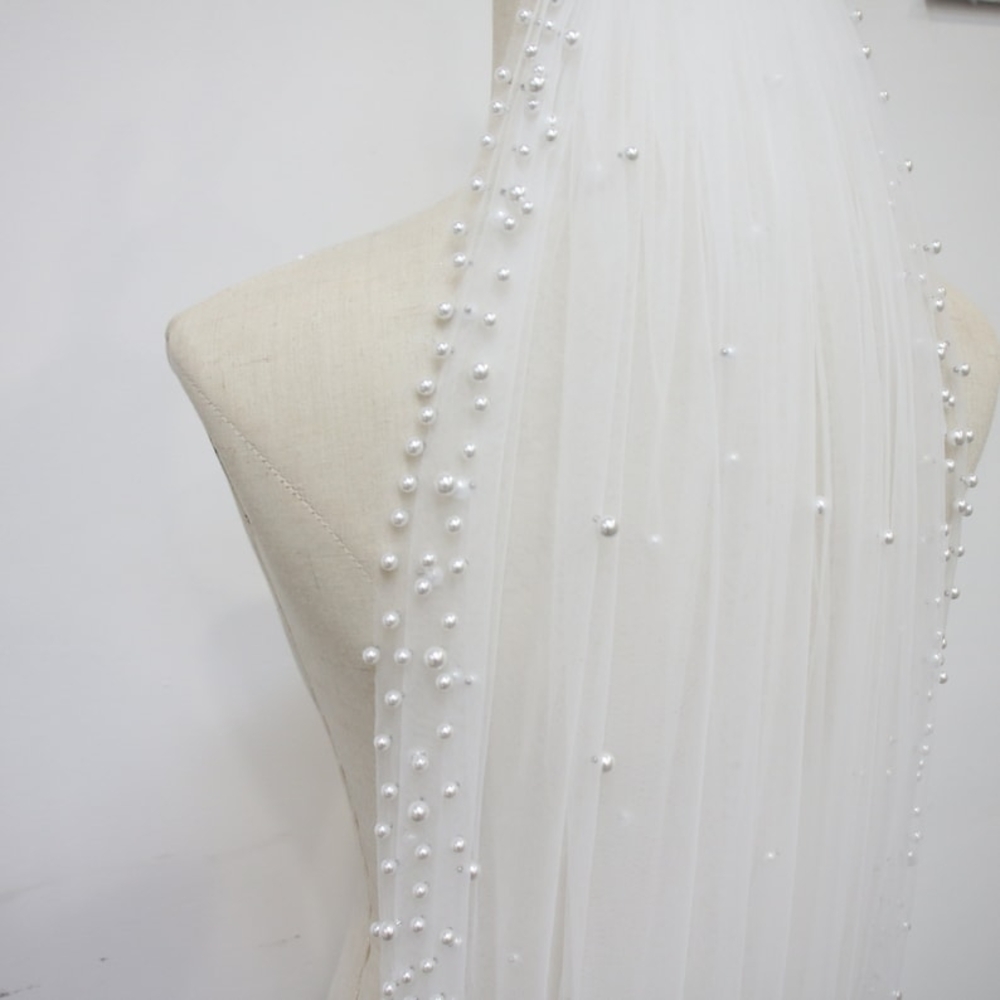 Elegant White Pearl-Embellished Veil
